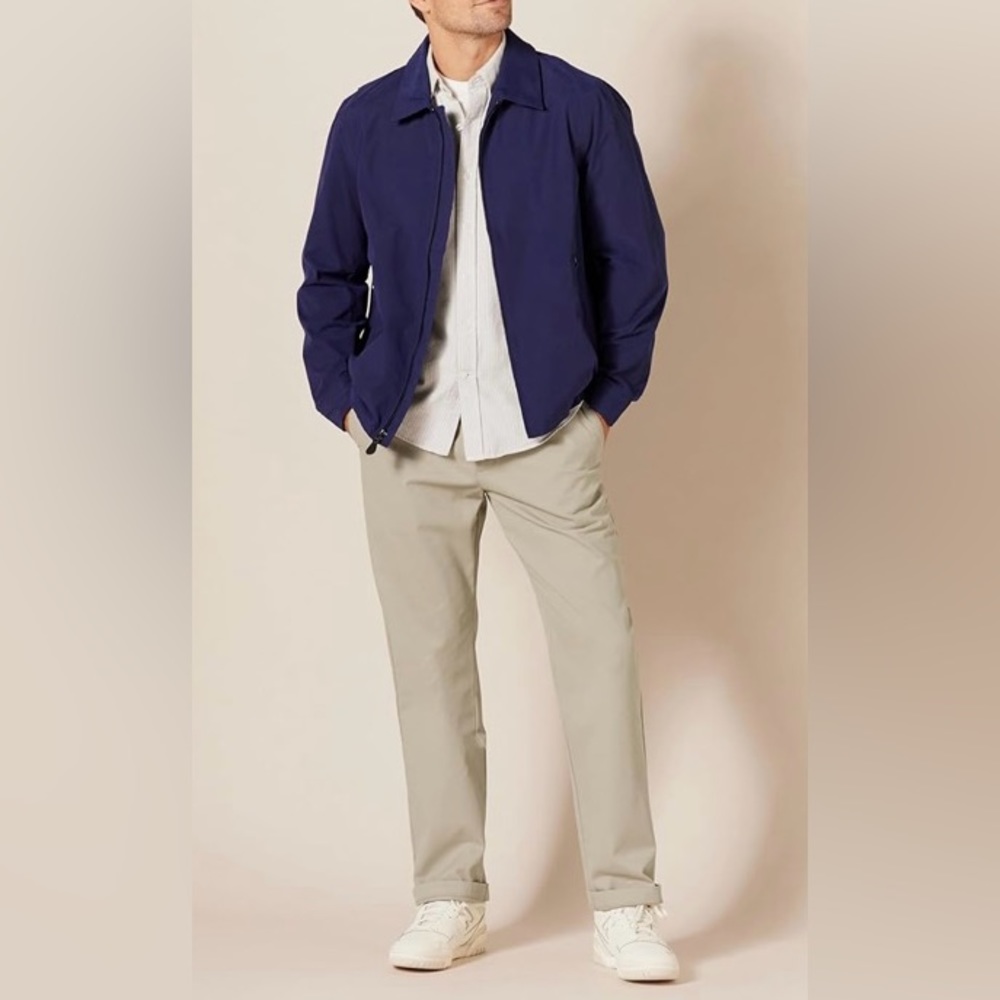 Men’s flat front classic fit khaki slacks.